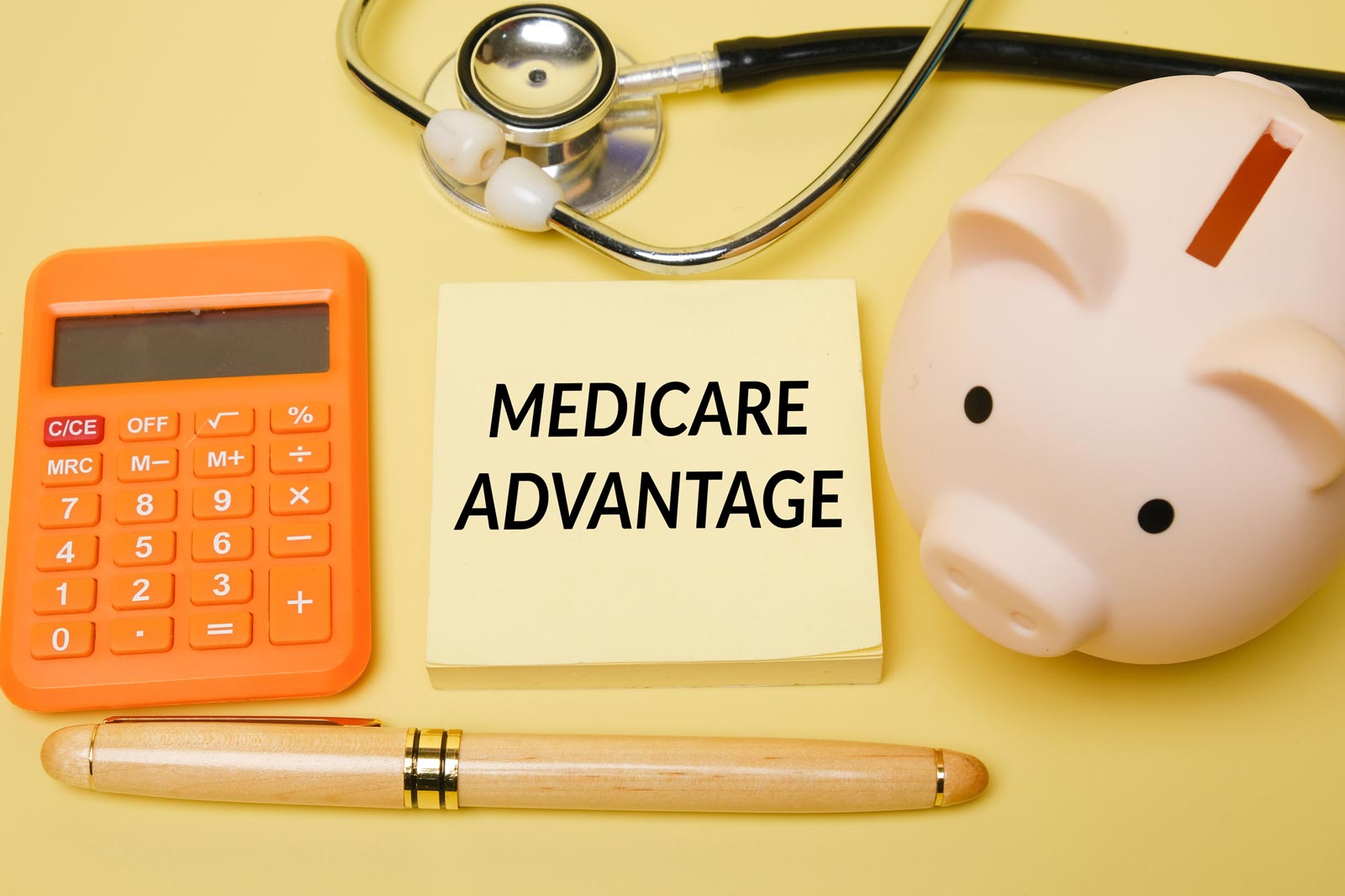 Sticky notes, calculator, and piggy bank for Medicare advantage plans in Kalamazoo, MI